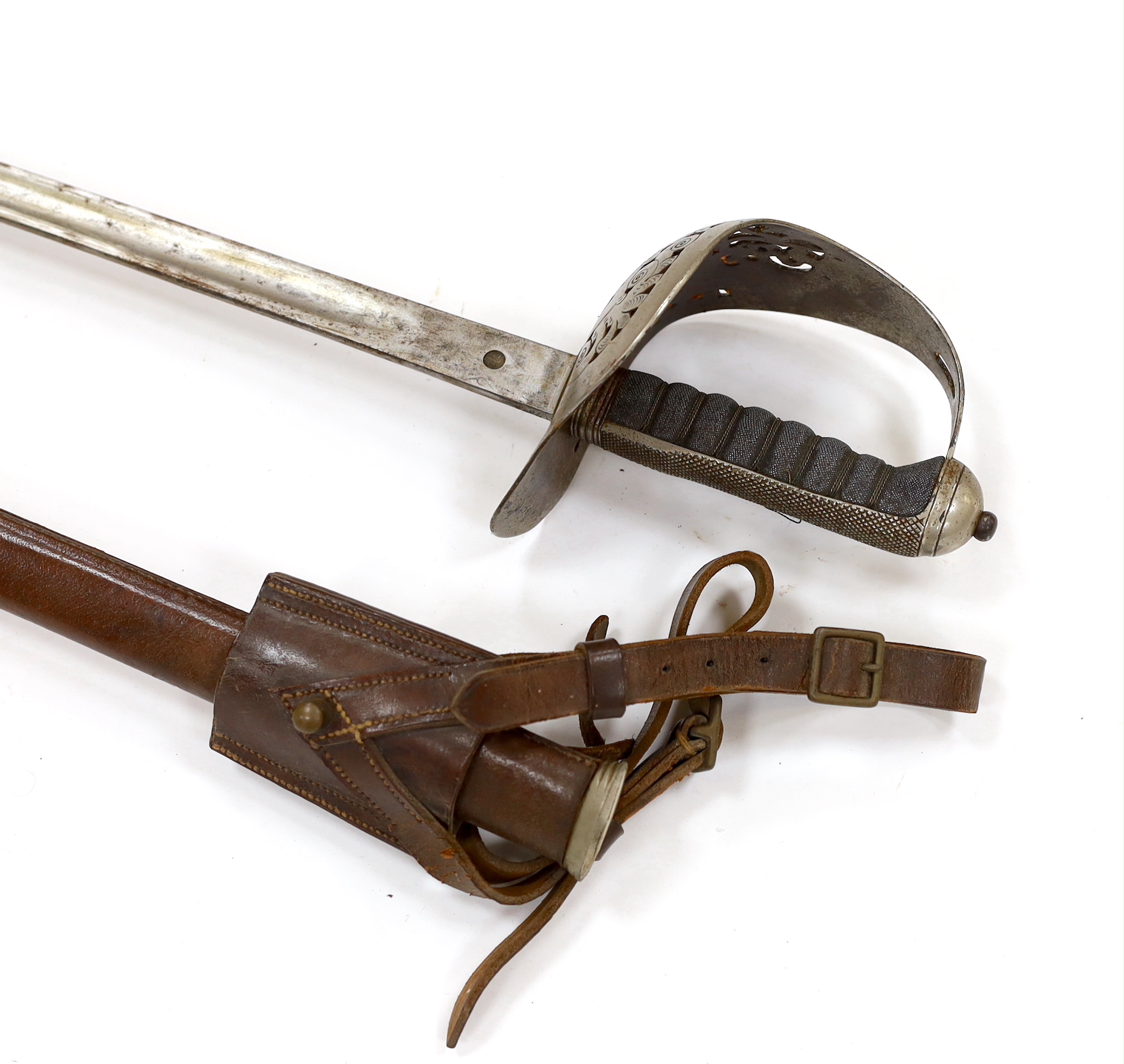 A George V 1897 pattern infantry officer's sword, with scabbard and leather hanger, blade 82cm